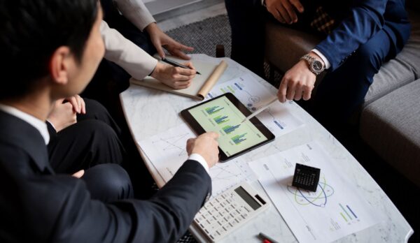business-people-working-with-ipad-high-angle
